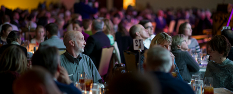 Guests listen to speaker at Remember America Speaker Series.